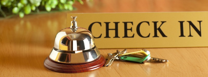 Vintage old hotel bell on the table